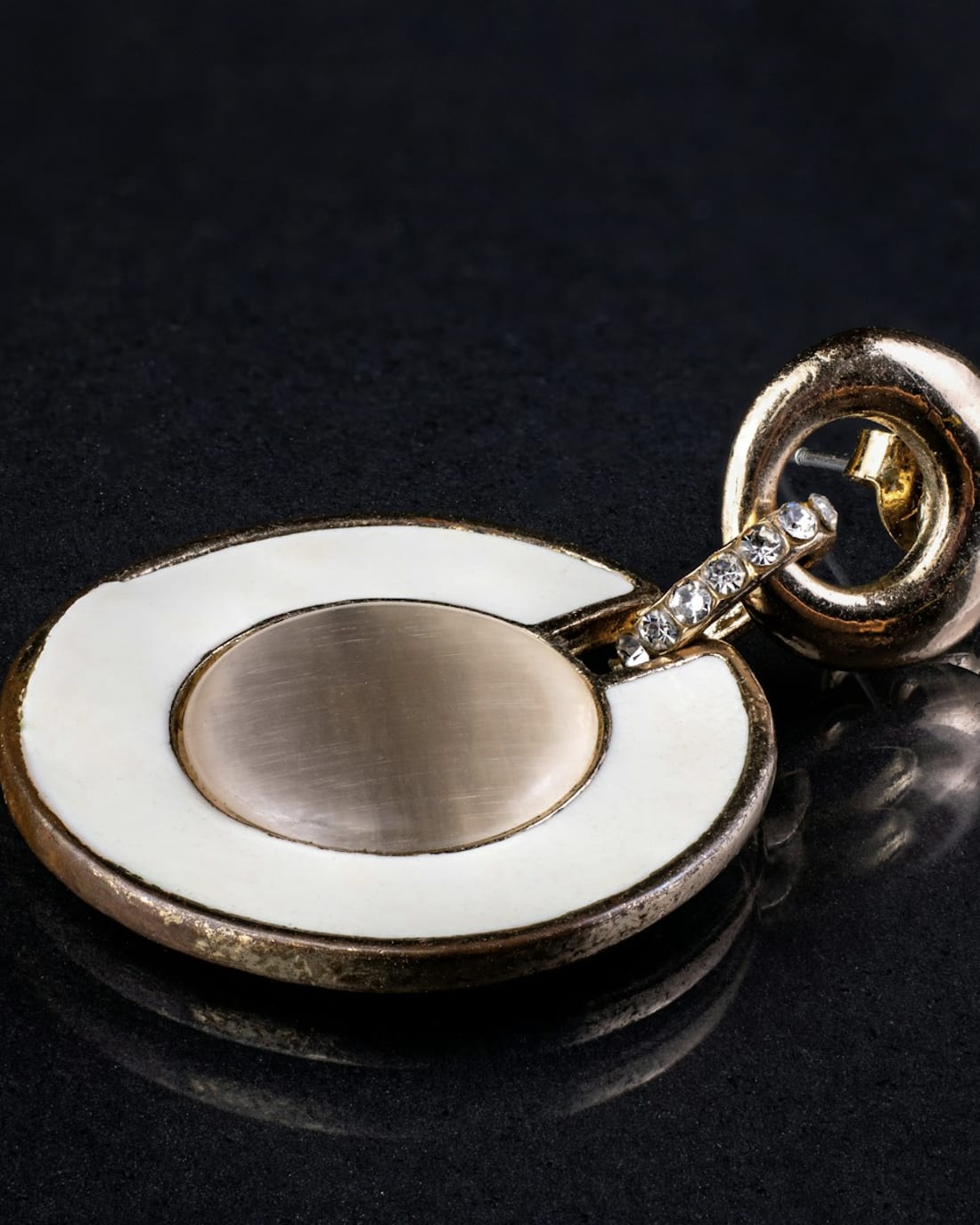 Gold and enamel locket with a diamond-set bail