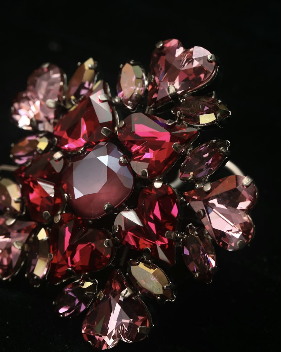 Spray brooch set with garnet and pink tourmaline